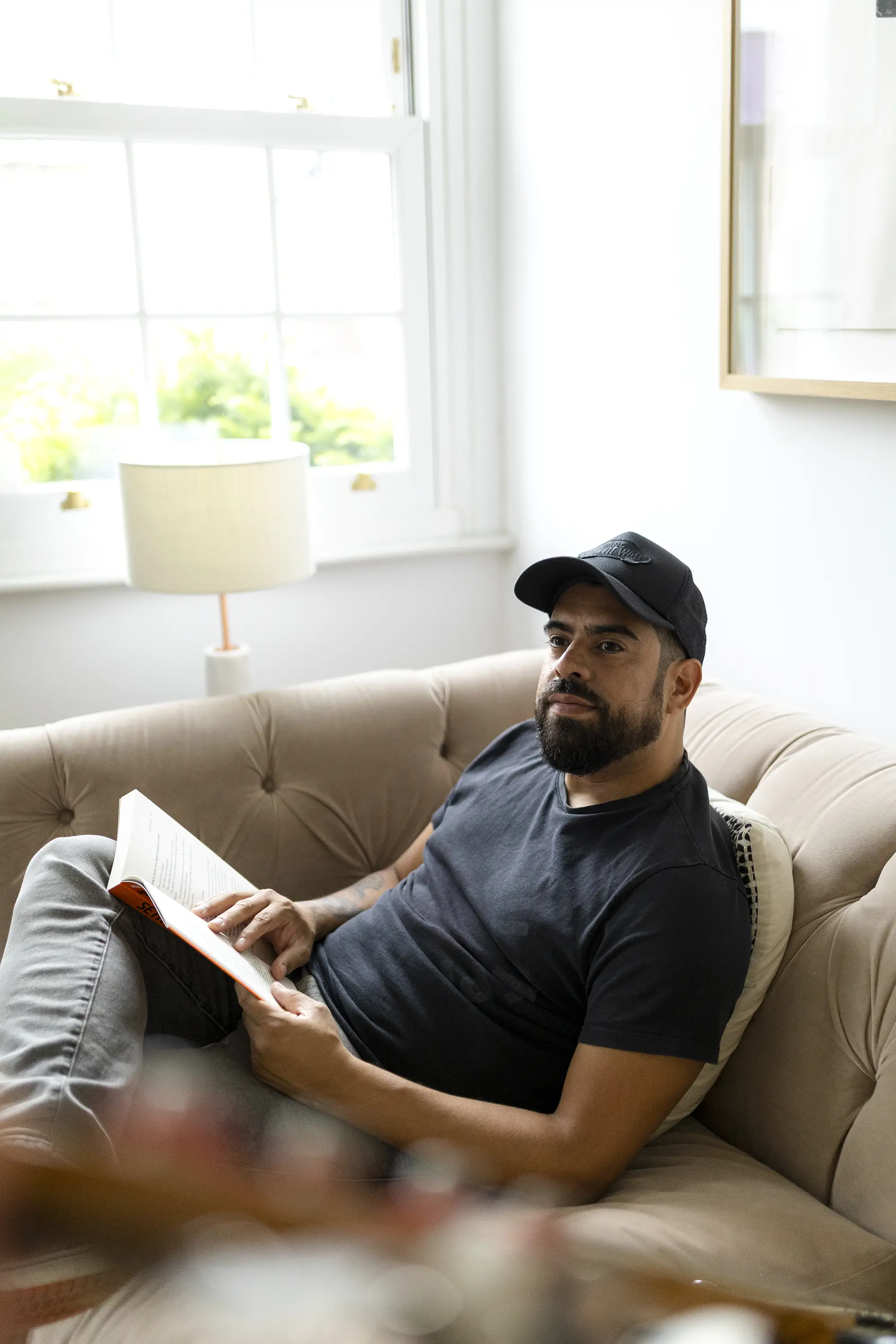 Daniel Rennie reading at home